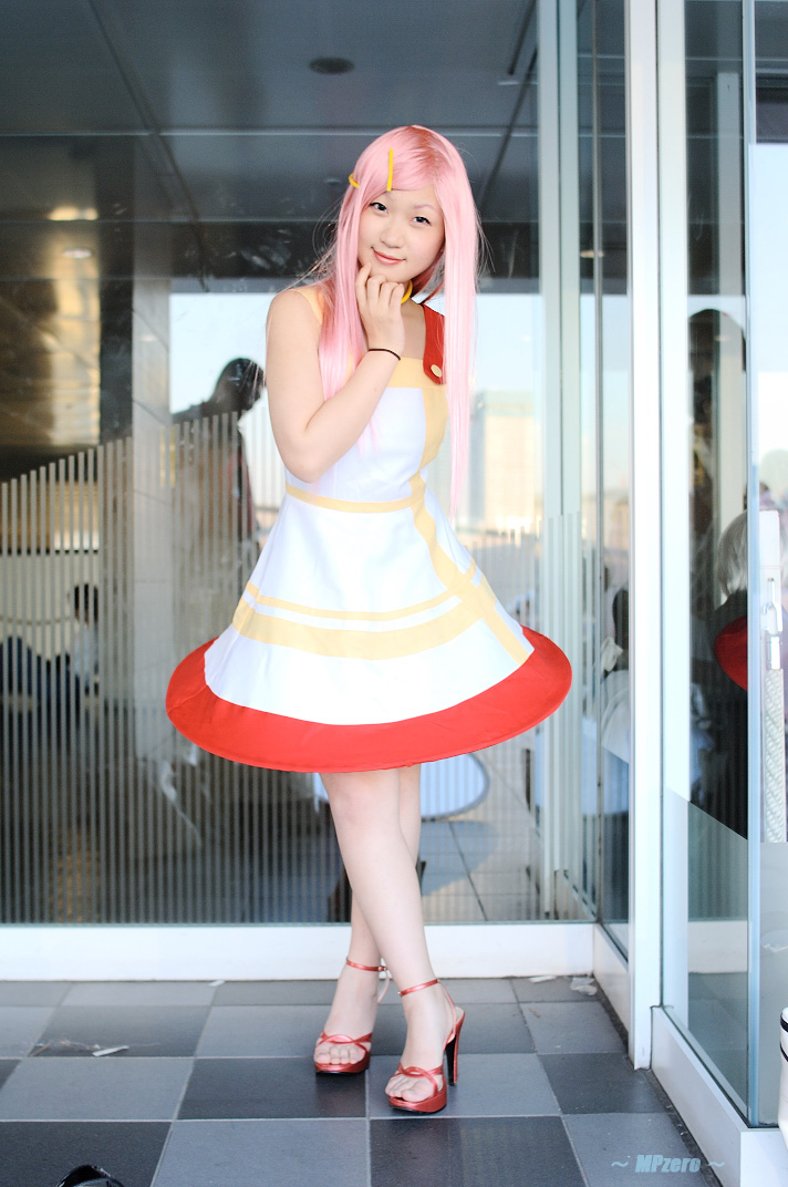takamura mashiro, anemone (eureka seven), eureka seven, eureka seven (series), photo (medium), 1girl, anemone (eureka seven) (cosplay), asian, bare legs, cosplay, dress, female focus, hair ornament, hairclip, high heels, long hair, looking at viewer, pink hair, red shoes, shoes, solo