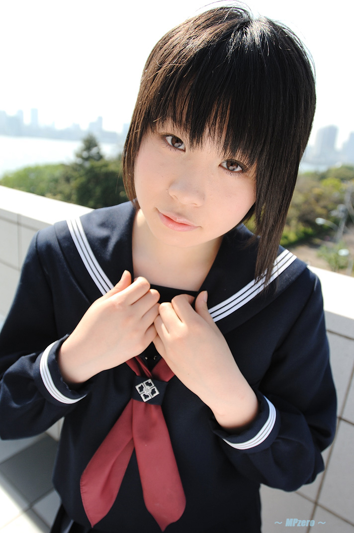touta miya, photo (medium), tagme, 1girl, asian, blurry, checkered floor, cosplay, depth of field, female focus, japanese (nationality), looking at viewer, outdoors, school uniform, serafuku, short hair, solo, tile wall, tiles