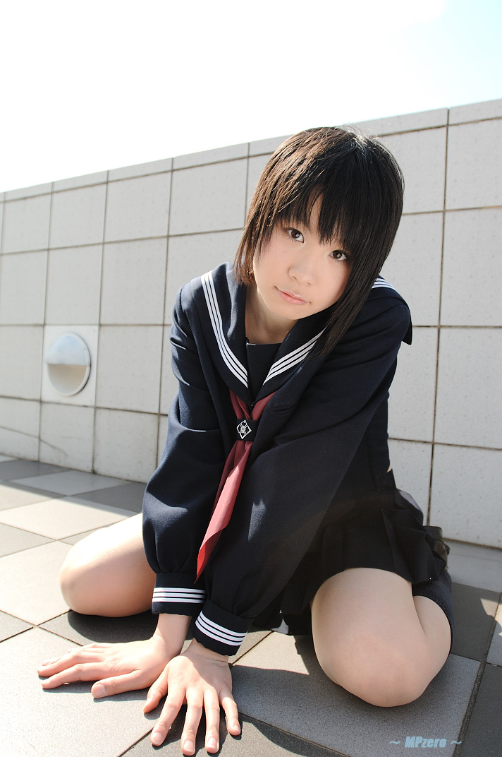touta miya, photo (medium), 1girl, arm support, asian, blurry, checkered floor, cosplay, depth of field, female focus, full body, japanese (nationality), kneehighs, looking at viewer, outdoors, school uniform, serafuku, short hair, sitting, socks, solo, tile wall, tiles, wariza