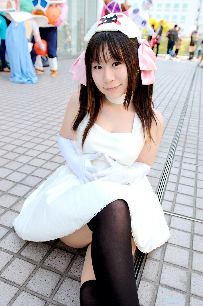kirekawa saku (model), ruriko nasu, pure trance, photo (medium), 1girl, asian, bow, cosplay, dutch angle, elbow gloves, gloves, hair bow, long hair, looking at viewer, nurse, outdoors, ruriko nasu (cosplay), smile, solo focus, thighhighs, twintails