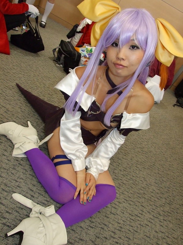 dizzy (guilty gear), arc system works, guilty gear, photo (medium), belt bra, bow, breasts, cosplay, dress, hair bow, onihara akira, open clothes, open dress, purple hair, thighhighs, underboob