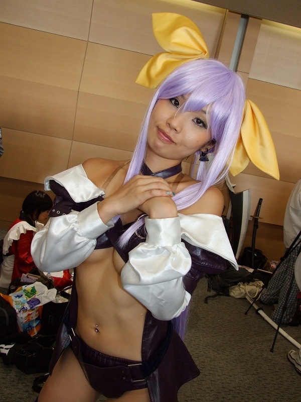 dizzy (guilty gear), arc system works, guilty gear, photo (medium), belt bra, bow, breasts, cosplay, dress, hair bow, onihara akira, open clothes, open dress, purple hair, thighhighs, underboob