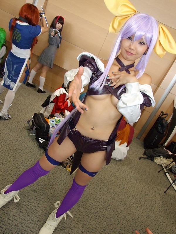 dizzy (guilty gear), arc system works, guilty gear, photo (medium), belt bra, bow, breasts, cosplay, dress, hair bow, onihara akira, open clothes, open dress, purple hair, thighhighs, underboob