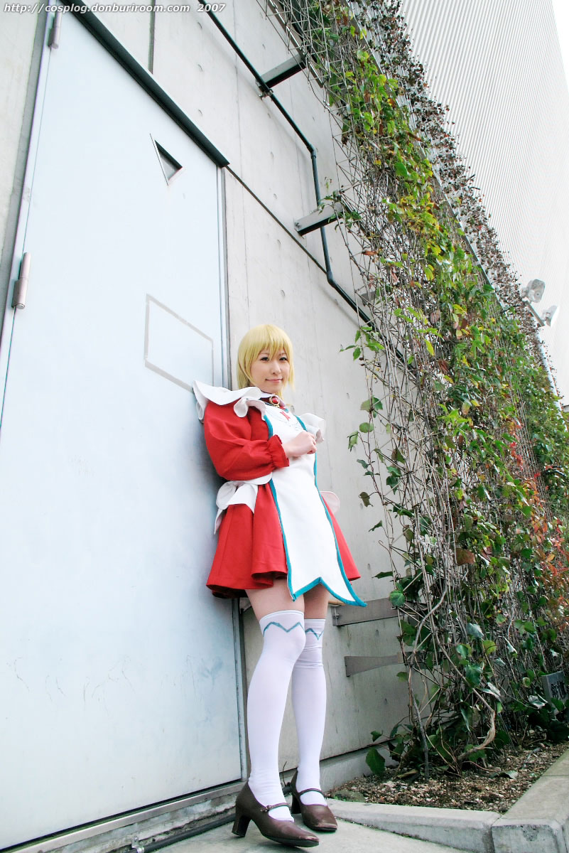 chippi, erstin ho, my-otome, highres, photo (medium), 1girl, 2007, apron, asian, blonde hair, blue eyes, brown shoes, color contacts, cosplay, erstin ho (cosplay), female focus, looking at viewer, maid, maid apron, outdoors, school uniform, shoes, short hair, solo, thighhighs, watermark, web address, white thighhighs, zettai ryouiki