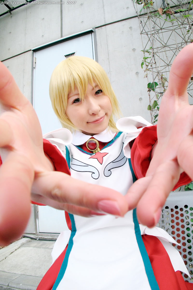 chippi, erstin ho, my-otome, highres, photo (medium), 1girl, 2007, apron, asian, bench, blonde hair, blue eyes, color contacts, cosplay, erstin ho (cosplay), female focus, looking at viewer, maid, maid apron, outdoors, school uniform, short hair, solo, watermark, web address