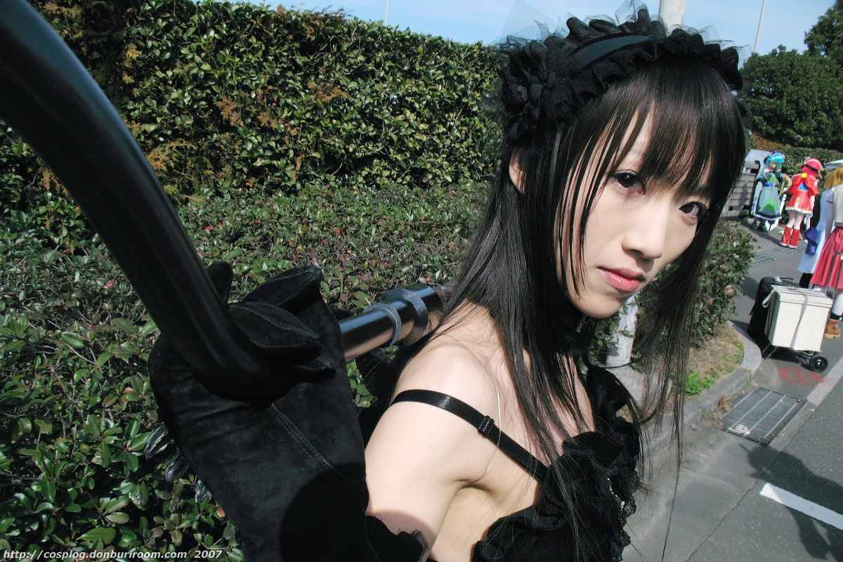 suzuyuki kaho, morte (vispo), vispo original, photo (medium), tagme, 2007, asian, bare shoulders, black gloves, cosplay, cross, frills, gloves, gothic lolita, hairband, hedge, japanese (nationality), lolita fashion, lolita hairband, looking at viewer, outdoors, scythe, solo focus, standing, tree, watermark, weapon, web address, wings