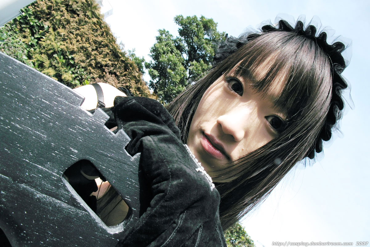 suzuyuki kaho, morte (vispo), vispo original, photo (medium), tagme, 1girl, 2007, asian, bare shoulders, black gloves, cosplay, cross, dutch angle, female focus, frills, gloves, gothic lolita, hairband, hedge, japanese (nationality), lolita fashion, lolita hairband, looking at viewer, outdoors, scythe, sky, solo, tree, watermark, weapon, web address, wings