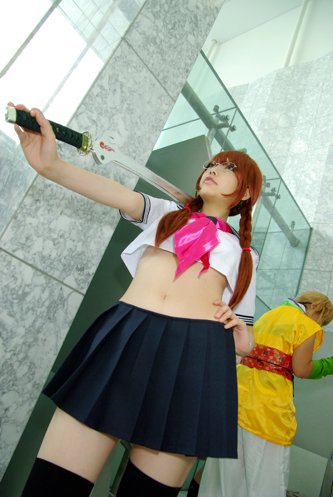namada, arisugawa shii, the art of yamashita shunya, photo (medium), 1girl, aqua eyes, arisugawa shii (cosplay), asian, black thighhighs, blue eyes, blurry, braid, brown hair, color contacts, contrapposto, cosplay, crop top, depth of field, dutch angle, glasses, green eyes, hand on own hip, lensless glasses, long hair, looking at viewer, midriff, miniskirt, outdoors, pleated skirt, sailor, school uniform, serafuku, short sleeves, skirt, solo focus, standing, sword, thighhighs, twin braids, weapon, zettai ryouiki
