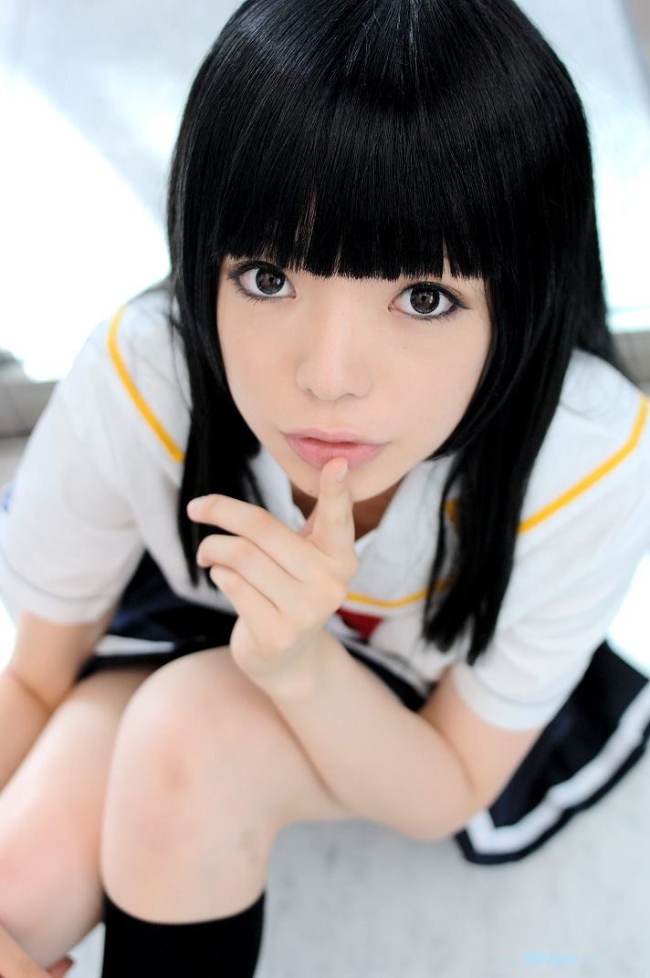 namada, futami eriko, kimi kiss, photo (medium), 1girl, asian, black hair, blunt bangs, blurry, breasts, cosplay, depth of field, eyeliner, female focus, finger to mouth, from above, futami eriko (cosplay), indoors, kneehighs, long hair, looking at viewer, makeup, miniskirt, on floor, pleated skirt, school uniform, serafuku, shushing, sitting, skirt, small breasts, socks, solo