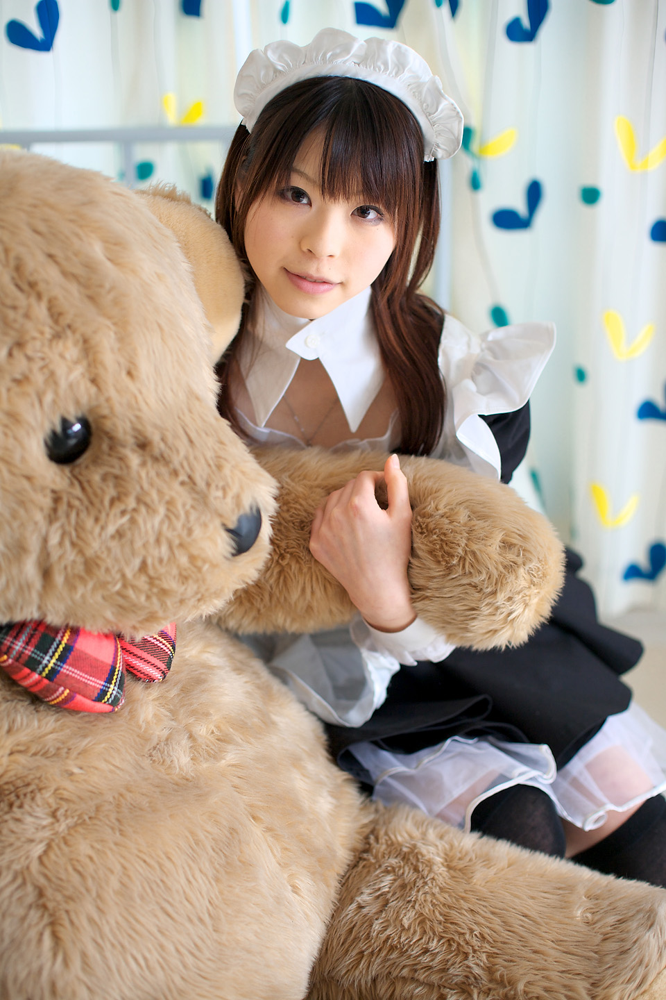 katou mari, highres, photo (medium), apron, cosplay, maid, maid apron, stuffed animal, stuffed toy, teddy bear, thighhighs