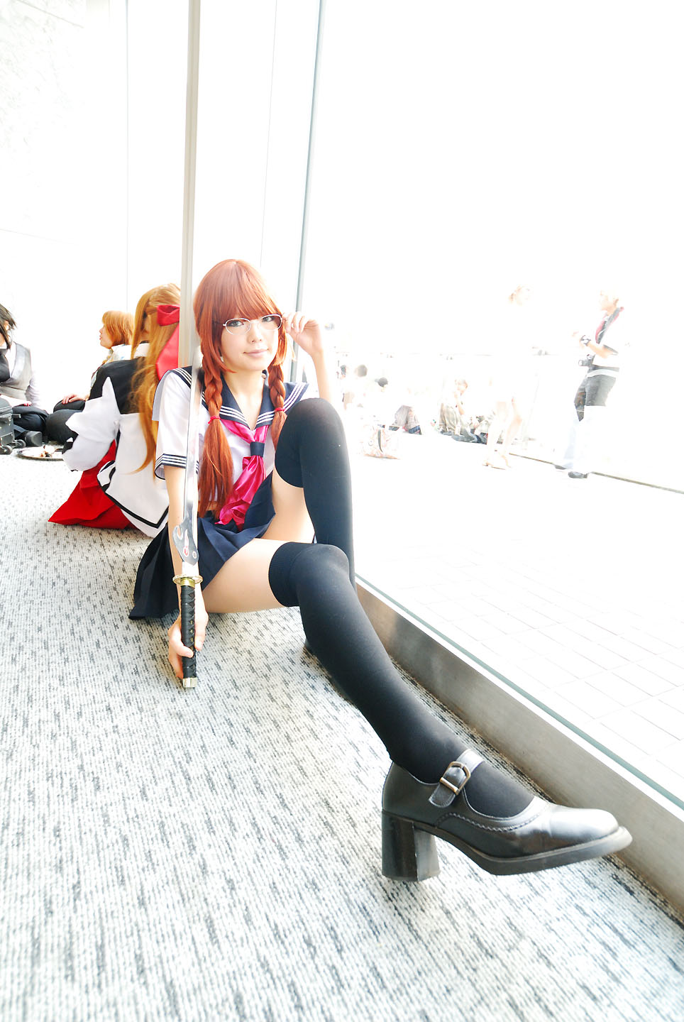 namada, arisugawa shii, the art of yamashita shunya, black footwear, black legwear, highres, photo (medium), 5girls, aqua eyes, arisugawa shii (cosplay), asian, blue eyes, blurry, braid, brown hair, color contacts, cosplay, crop top, depth of field, glasses, green eyes, high heels, lensless glasses, long hair, looking at viewer, mary janes, midriff, miniskirt, multiple girls, on floor, pleated skirt, rug, sailor, school uniform, serafuku, shoes, short sleeves, sitting, skirt, solo focus, sword, thighhighs, twin braids, weapon, zettai ryouiki