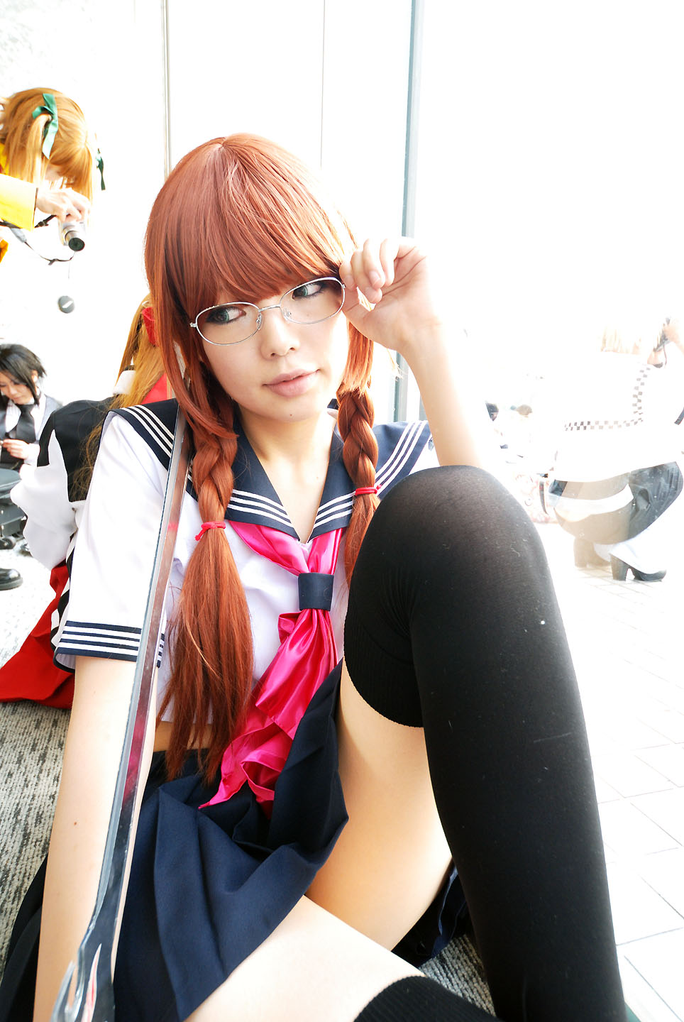 namada, arisugawa shii, the art of yamashita shunya, black legwear, highres, photo (medium), 5girls, aqua eyes, arisugawa shii (cosplay), asian, blue eyes, blurry, braid, brown hair, color contacts, cosplay, crop top, depth of field, glasses, green eyes, high heels, lensless glasses, long hair, looking to the side, midriff, miniskirt, multiple girls, on floor, pleated skirt, rug, sailor, school uniform, serafuku, short sleeves, sitting, skirt, solo focus, sword, thighhighs, twin braids, weapon, zettai ryouiki