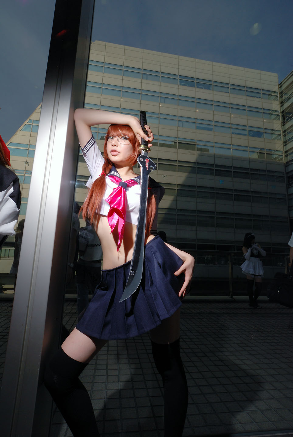 namada, arisugawa shii, the art of yamashita shunya, black legwear, highres, photo (medium), 2girls, aqua eyes, arisugawa shii (cosplay), asian, blue eyes, blurry, braid, brown hair, color contacts, cosplay, crop top, depth of field, dutch angle, elbow gloves, glasses, gloves, green eyes, lensless glasses, long hair, looking at viewer, maid, maid headdress, midriff, miniskirt, multiple girls, pleated skirt, sailor, school uniform, serafuku, short sleeves, skirt, solo focus, standing, sword, thighhighs, twin braids, weapon, zettai ryouiki