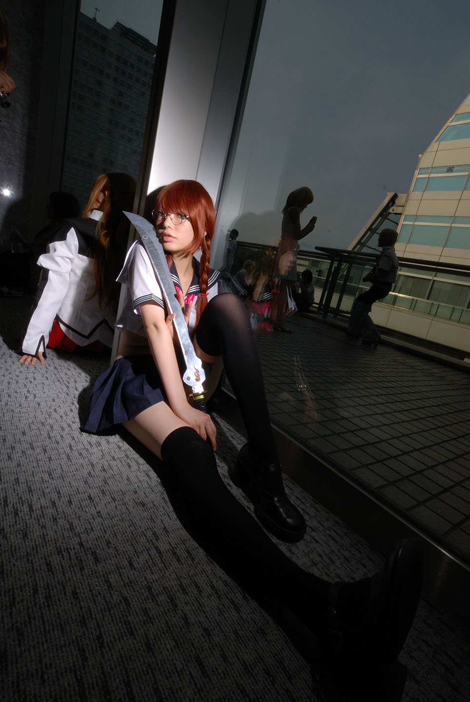 namada, arisugawa shii, the art of yamashita shunya, black footwear, black legwear, highres, photo (medium), 3girls, aqua eyes, arisugawa shii (cosplay), asian, blue eyes, blurry, braid, brown hair, color contacts, cosplay, crop top, depth of field, dutch angle, glasses, green eyes, high heels, indoors, lensless glasses, long hair, looking at viewer, mary janes, midriff, miniskirt, multiple girls, on floor, pleated skirt, rug, sailor, school uniform, serafuku, shoes, short sleeves, sitting, skirt, solo focus, sword, thighhighs, twin braids, weapon, zettai ryouiki