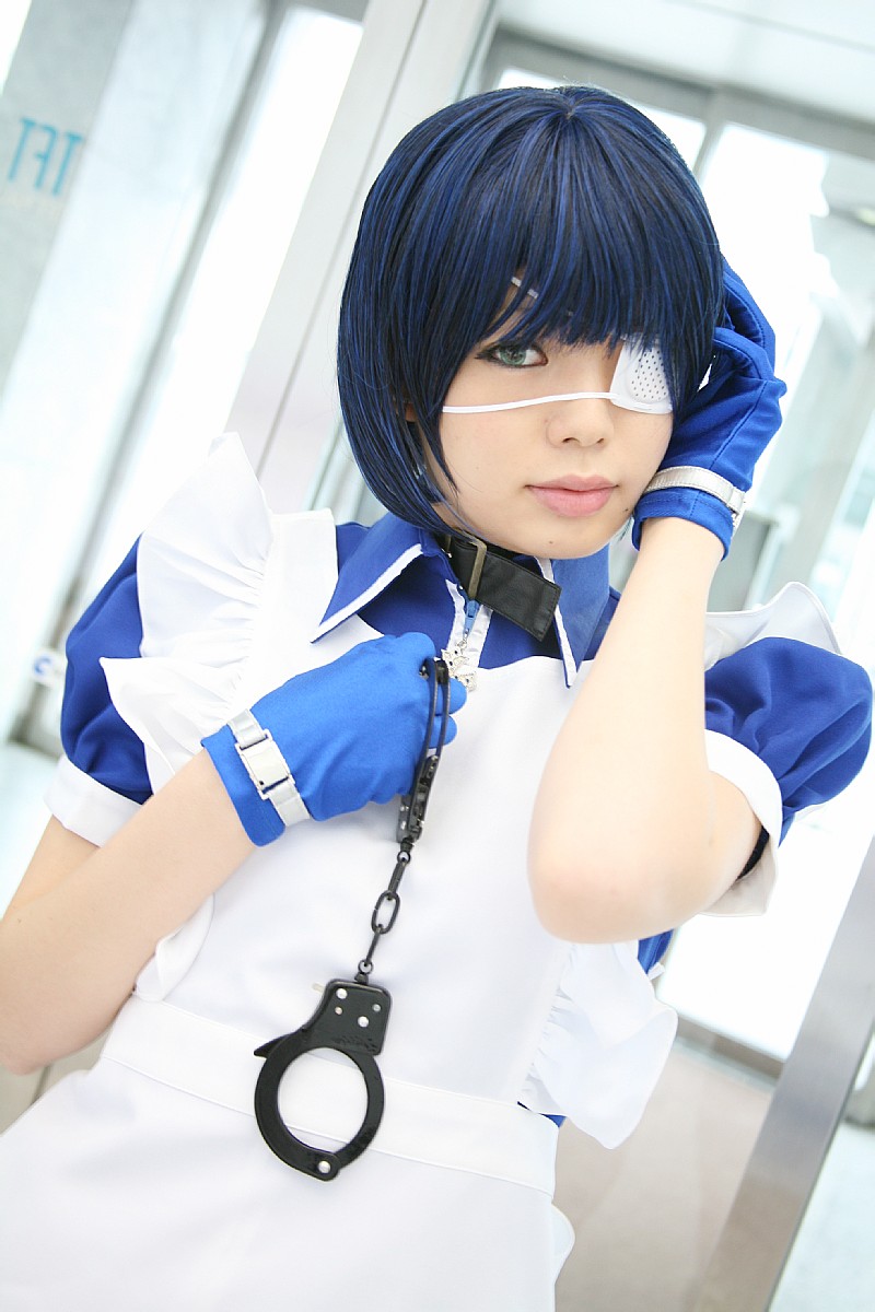 namada, ryomou shimei, ikkitousen, highres, photo (medium), 1girl, apron, asian, blue eyes, blue gloves, blue hair, collar, color contacts, cosplay, cross, cuffs, dutch angle, eyepatch, female focus, gloves, handcuffs, looking at viewer, maid, maid apron, puffy short sleeves, puffy sleeves, ryomou shimei (cosplay), short sleeves, solo, standing