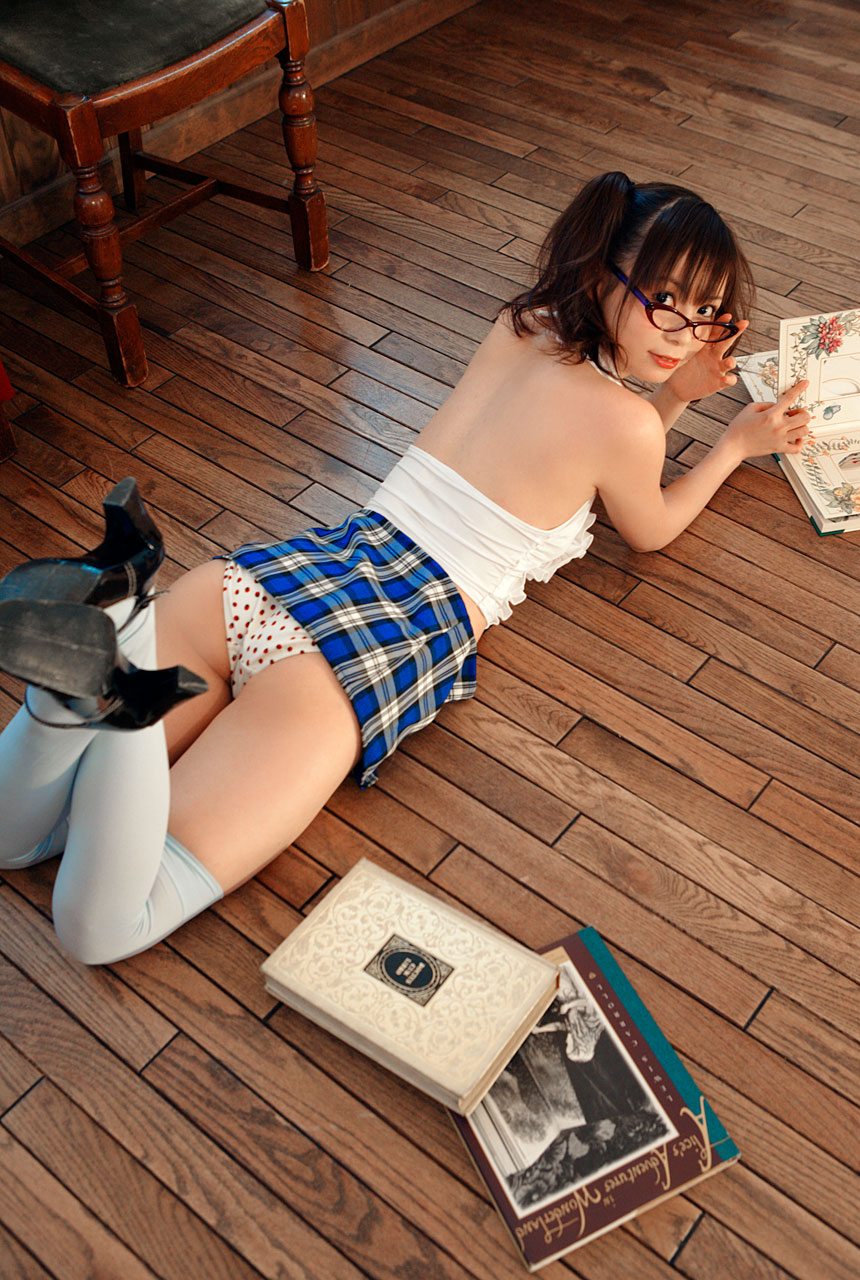 nakagawa shoko, nakagawa shouko, highres, photo (medium), 1girl, ass, book, female focus, glasses, high heels, lying, mary janes, miniskirt, on stomach, panties, pantyshot, plaid clothes, plaid skirt, shoes, skirt, solo, strawberry pattern, thighhighs, twintails, underwear, wooden floor