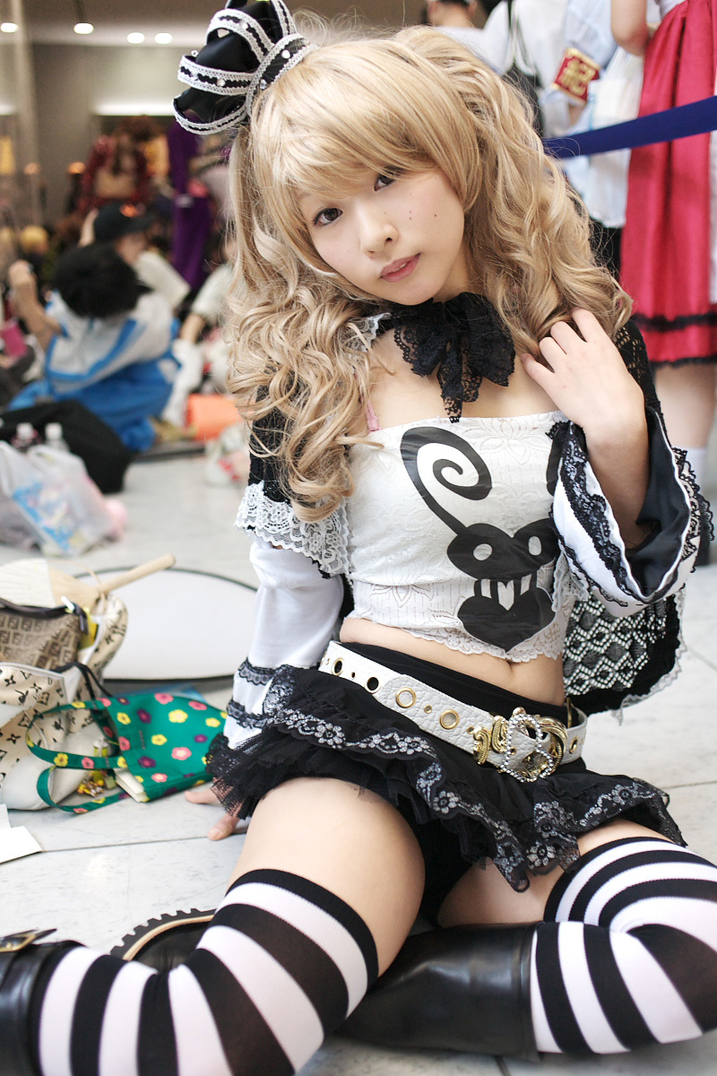 perona, one piece, black footwear, highres, photo (medium), 1girl, belt, blonde hair, boots, bow, camisole, capelet, cosplay, crown, frills, lace, patterned legwear, perona (cosplay), shoes, short cape, skirt, striped clothes, striped thighhighs, thighhighs, thriller bark, twintails, white belt, yoshikawa sunao