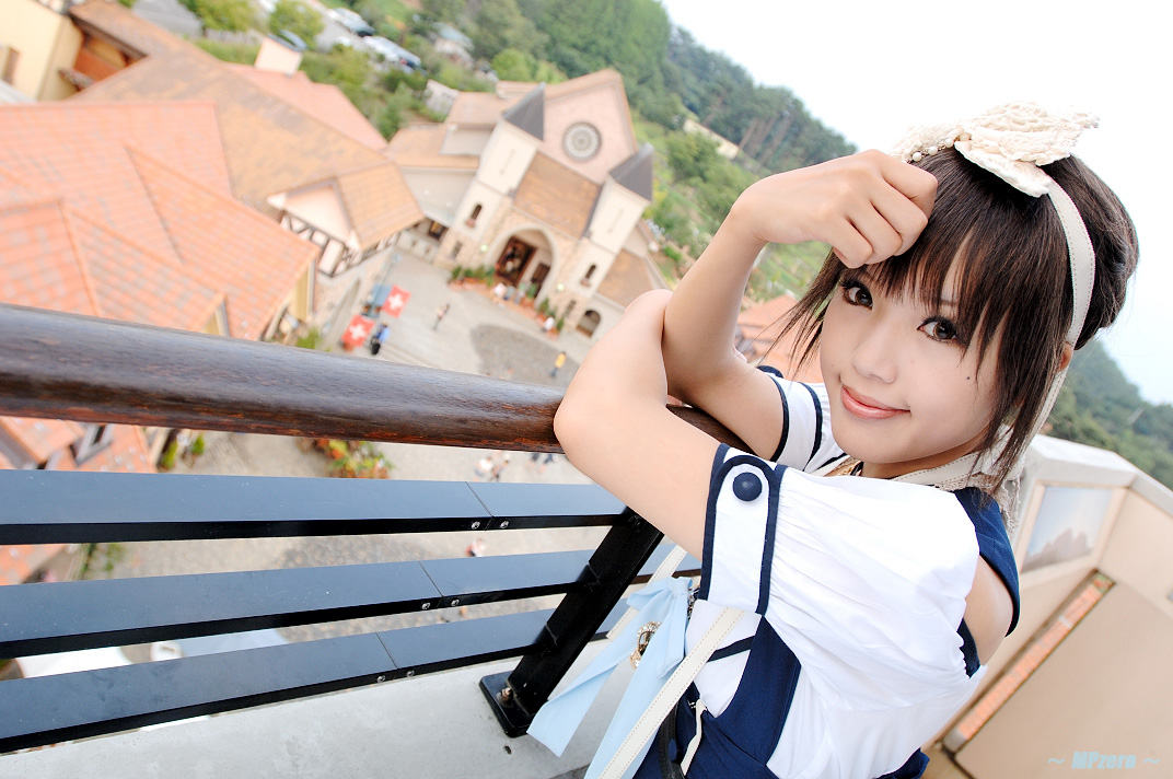 kipi-san, acasius boarding school, photo (medium), 1girl, asian, bow, brown hair, cosplay, dutch angle, female focus, hair bow, heidi's village, looking at viewer, mole, outdoors, school uniform, short hair, solo