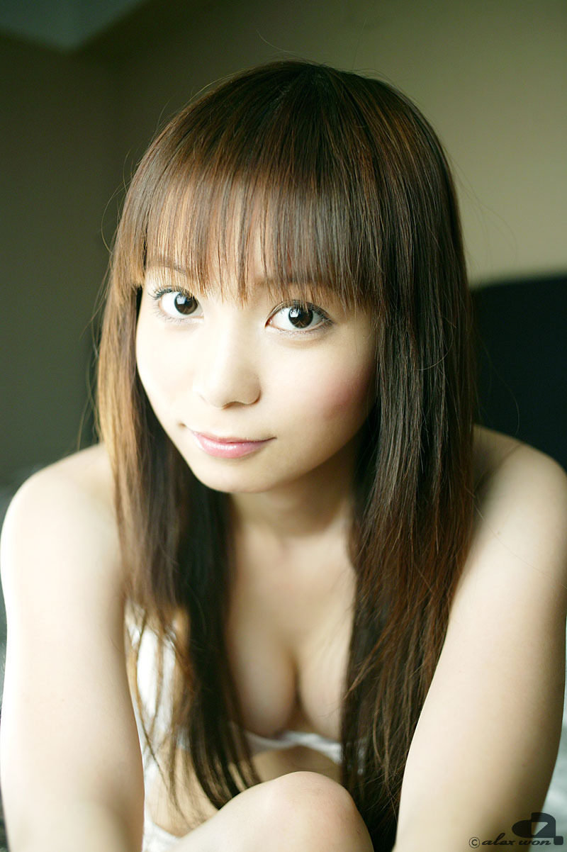 nakagawa shoko, highres, photo (medium), bed, bikini, breasts, cleavage, side-tie bikini bottom, swimsuit