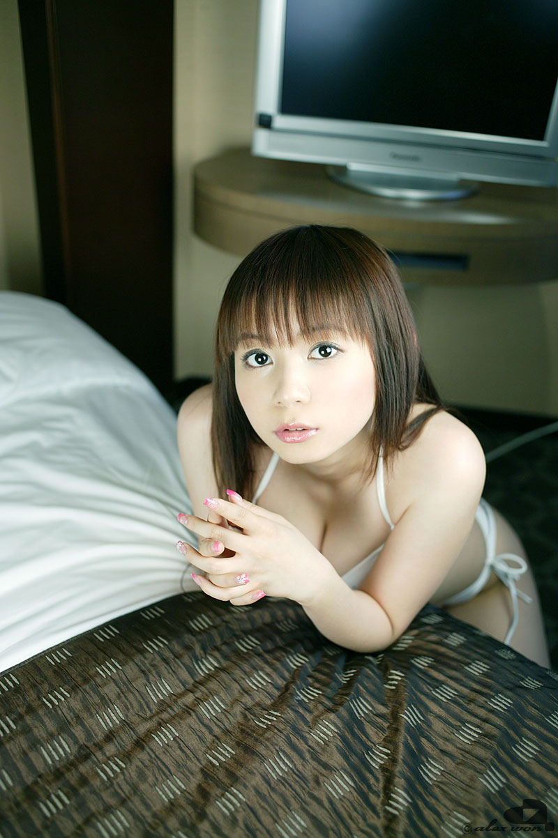 nakagawa shoko, highres, photo (medium), bed, bikini, breasts, cleavage, side-tie bikini bottom, swimsuit