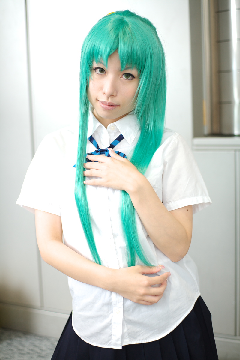 momose riyu, sonozaki shion, higurashi no naku koro ni, highres, photo (medium), 1girl, asian, bow, color contacts, cosplay, female focus, green eyes, green hair, hair bow, indoors, kneehighs, long hair, looking at viewer, matching hair/eyes, mole, school uniform, socks, solo, sonozaki shion (cosplay), standing
