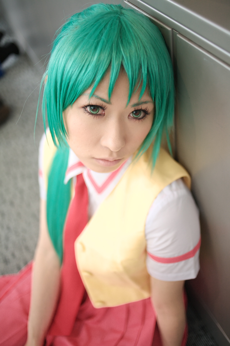 chippi, sonozaki mion, higurashi no naku koro ni, highres, photo (medium), 1girl, asian, color contacts, cosplay, female focus, green eyes, green hair, indoors, long hair, looking at viewer, matching hair/eyes, necktie, on floor, school uniform, sitting, solo, sonozaki mion (cosplay), vest