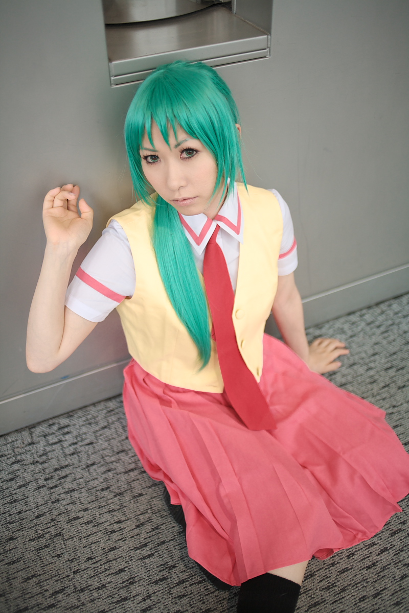 chippi, sonozaki mion, higurashi no naku koro ni, highres, photo (medium), 1girl, arm support, asian, color contacts, cosplay, female focus, green eyes, green hair, indoors, kneehighs, long hair, looking at viewer, matching hair/eyes, necktie, on floor, school uniform, sitting, socks, solo, sonozaki mion (cosplay), vest