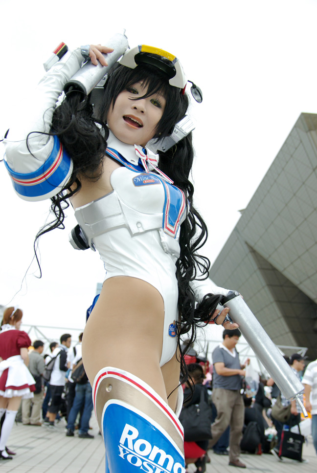 kobayakawa saiko (model), mine blue, private material romantis, photo (medium), bodysuit, boots, cosplay, elbow gloves, gloves, helmet, motorcycle parts, thigh boots, thighhighs, twintails