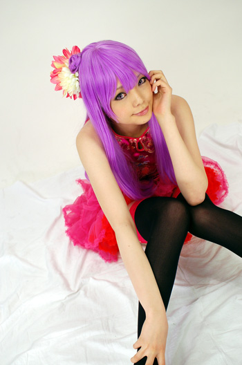 namada, lace-trimmed legwear, character request, copyright request, photo (medium), 1girl, asian, bare shoulders, black thighhighs, breasts, china dress, chinese clothes, cosplay, dress, eyeliner, female focus, flower, frilled skirt, frills, garter belt, hair flower, hair ornament, indoors, knees together feet apart, lace, lace trim, long hair, looking at viewer, makeup, miniskirt, on floor, parted lips, pink dress, pink skirt, purple hair, sitting, skirt, small breasts, solo, thighhighs