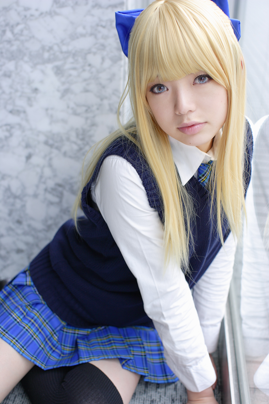namada, character request, highres, photo (medium), 1girl, against glass, asian, black thighhighs, blonde hair, blue eyes, blue ribbon, blurry, bow, breasts, color contacts, cosplay, depth of field, dress shirt, female focus, hair bow, indoors, looking at viewer, miniskirt, on floor, parted lips, pleated skirt, ribbon, rug, school uniform, shirt, sitting, skirt, small breasts, solo, sweater vest, thighhighs, white shirt, window, yokozuwari, zettai ryouiki