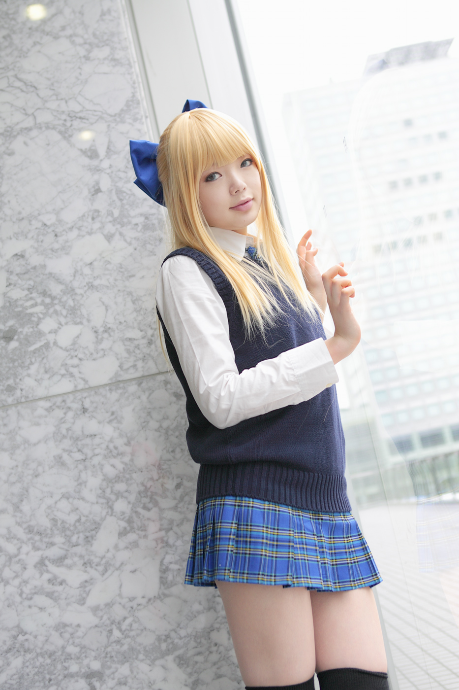 namada, character request, highres, photo (medium), 1girl, against glass, asian, black thighhighs, blonde hair, blue eyes, blue ribbon, blurry, bow, breasts, color contacts, cosplay, depth of field, dress shirt, dutch angle, female focus, hair bow, indoors, looking at viewer, miniskirt, mole, mole under mouth, necktie, plaid clothes, plaid skirt, pleated skirt, ribbon, school uniform, shirt, skirt, small breasts, solo, standing, sweater vest, thighhighs, white shirt, window, zettai ryouiki