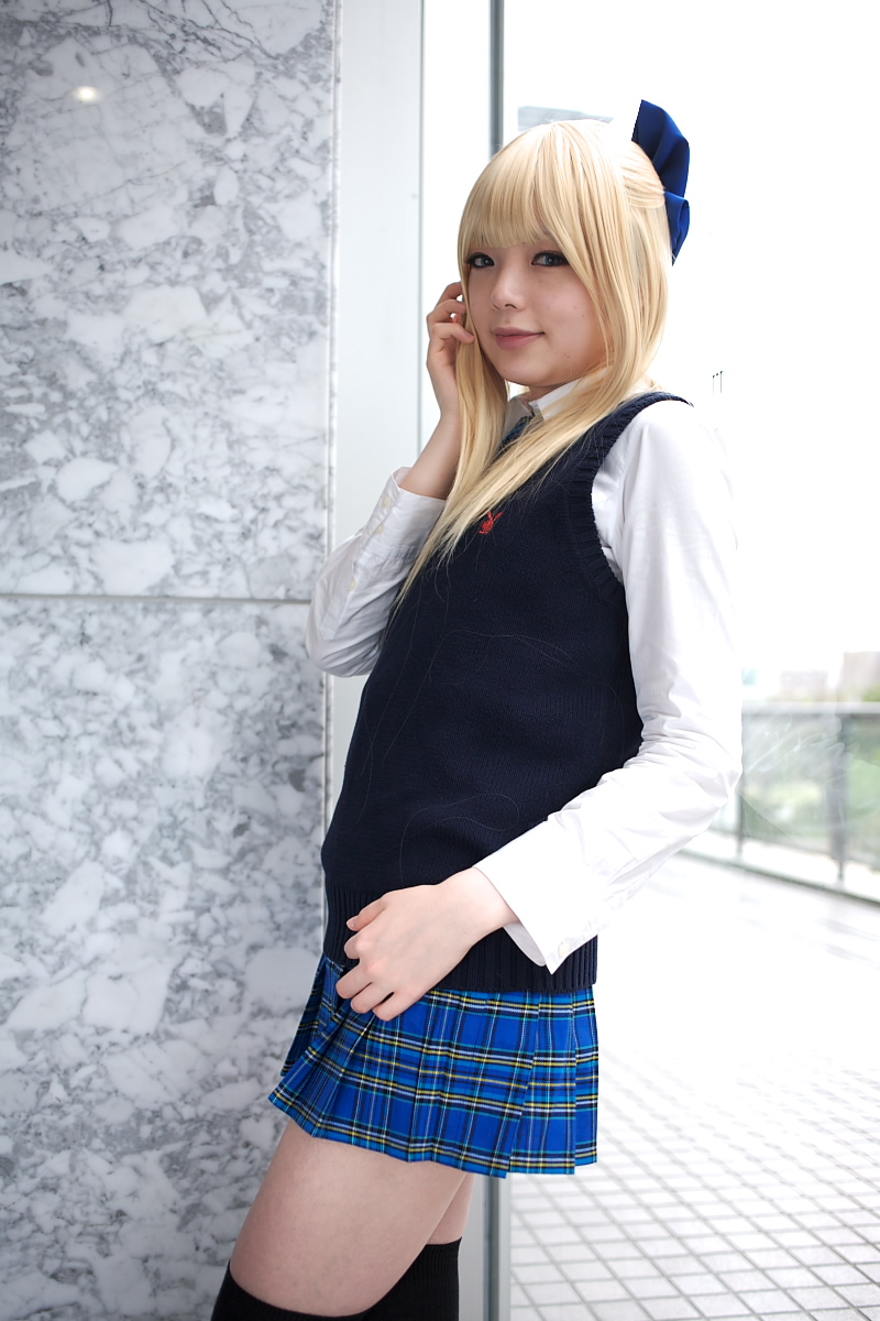 namada, character request, highres, photo (medium), 1girl, against glass, asian, black thighhighs, blonde hair, blue eyes, blue ribbon, blurry, bow, breasts, color contacts, cosplay, depth of field, dress shirt, female focus, hair bow, indoors, looking at viewer, miniskirt, mole, mole under mouth, necktie, plaid clothes, plaid skirt, pleated skirt, ribbon, school uniform, shirt, skirt, small breasts, solo, standing, sweater vest, thighhighs, white shirt, window, zettai ryouiki