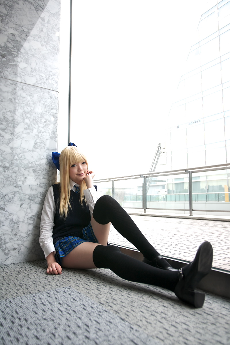 namada, character request, highres, photo (medium), 1girl, asian, black shoes, black thighhighs, blonde hair, blue eyes, blue ribbon, blurry, bow, breasts, color contacts, cosplay, depth of field, dress shirt, female focus, hair bow, head rest, high heels, indoors, looking at viewer, mary janes, miniskirt, on floor, plaid clothes, plaid skirt, pleated skirt, ribbon, rug, school uniform, shirt, shoes, sitting, skirt, small breasts, solo, sweater vest, thighhighs, white shirt, window, zettai ryouiki