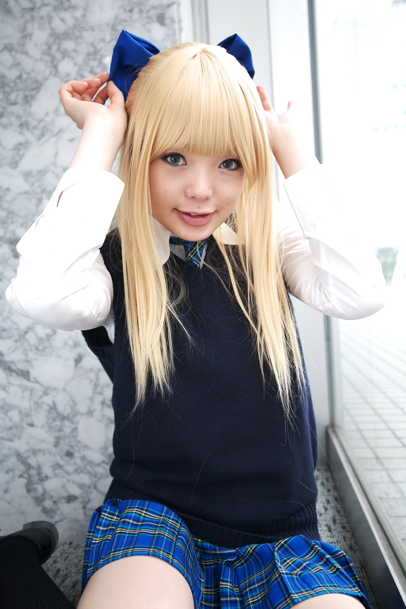 namada, character request, highres, photo (medium), 1girl, asian, black shoes, black thighhighs, blonde hair, blue eyes, blue ribbon, blurry, bow, breasts, color contacts, cosplay, depth of field, dress shirt, female focus, hair bow, indoors, looking at viewer, mary janes, miniskirt, on floor, parted lips, pleated skirt, ribbon, rug, school uniform, shirt, shoes, sitting, skirt, small breasts, solo, sweater vest, thighhighs, white shirt, window, yokozuwari