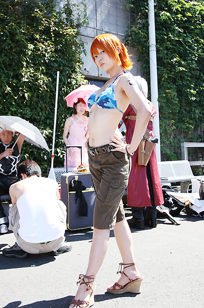 amanone shun, dante (devil may cry), nami (one piece), nami (one piece) (skypiea), capcom, devil may cry (series), one piece, photo (medium), asian, belt, bikini, bikini top only, boots, bracelet, brown eyes, camouflage, cargo shorts, cosplay, dante (cosplay), feet, female focus, full body, hands on own hips, jacket, jewelry, long coat, looking at viewer, midriff, nami (one piece) (cosplay), navel, orange hair, outdoors, pink umbrella, red jacket, sandals, shorts, shoulder tattoo, skypiea, swimsuit, tattoo, umbrella, wedge heels, white hair