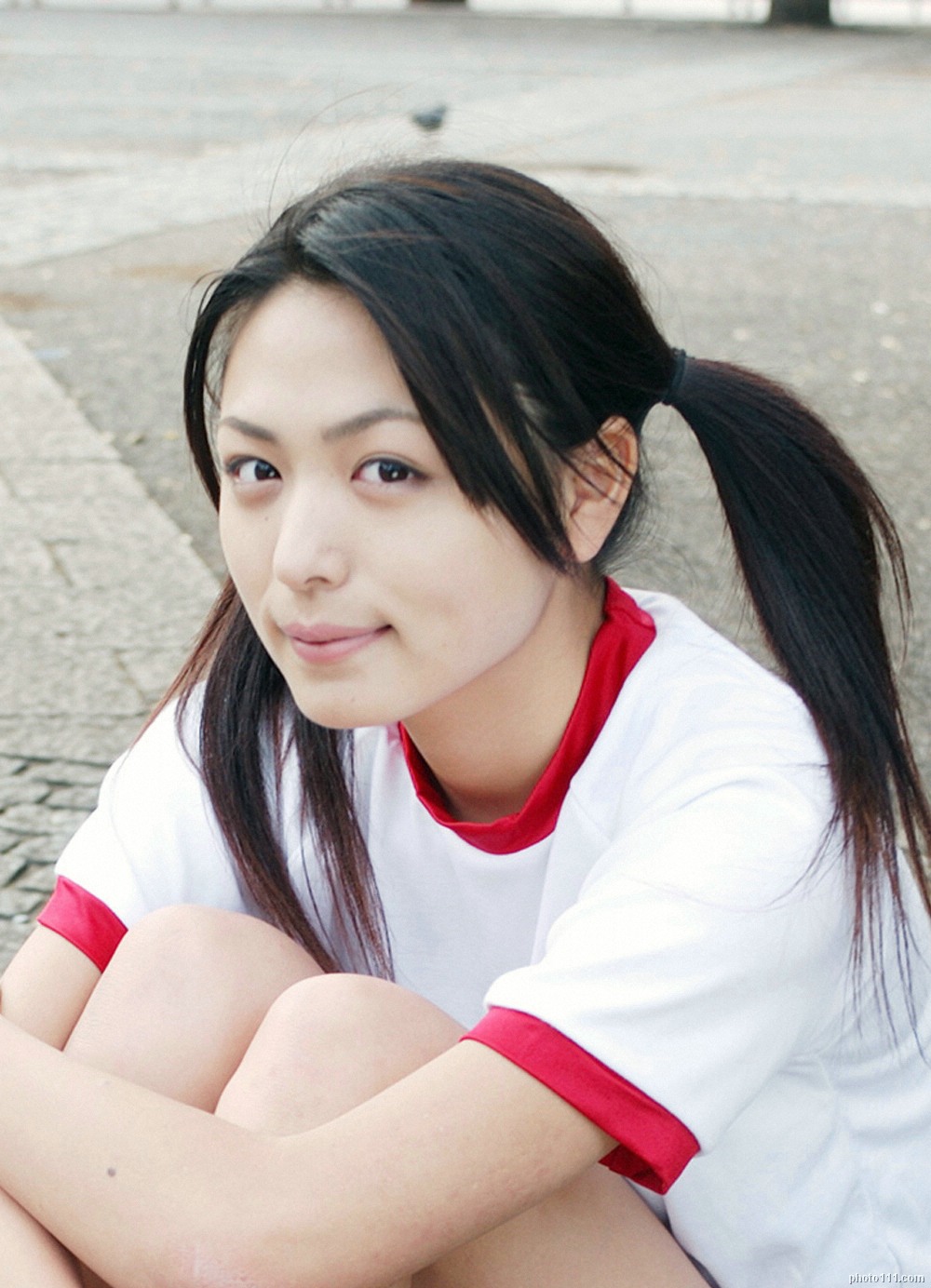 kawamura yuki, highres, photo (medium), tagme, 1girl, asian, black hair, breasts, cosplay, female focus, gym uniform, looking at viewer, medium breasts, outdoors, solo, twintails