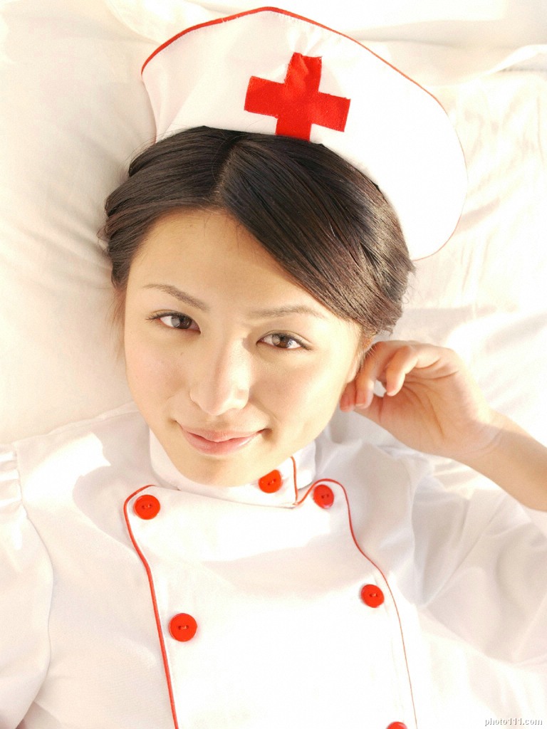 kawamura yuki, photo (medium), tagme, 1girl, asian, cosplay, female focus, hat, indoors, looking at viewer, nurse, nurse cap, smile, solo