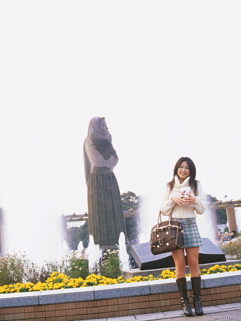 kawamura yuki, photo (medium), tagme, 1girl, asian, bag, boots, dutch angle, female focus, flower, fountain, handbag, long hair, looking at viewer, miniskirt, outdoors, plaid clothes, plaid skirt, pleated skirt, skirt, sky, smile, solo, statue, sweater