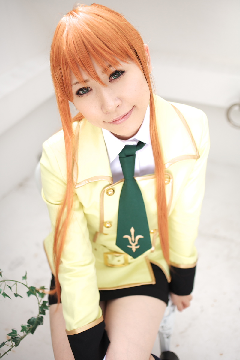 chippi, shirley fenette, code geass, highres, photo (medium), 1girl, asian, blazer, blue eyes, color contacts, cosplay, female focus, jacket, long hair, looking at viewer, miniskirt, orange hair, school uniform, shirley fenette (cosplay), skirt, solo