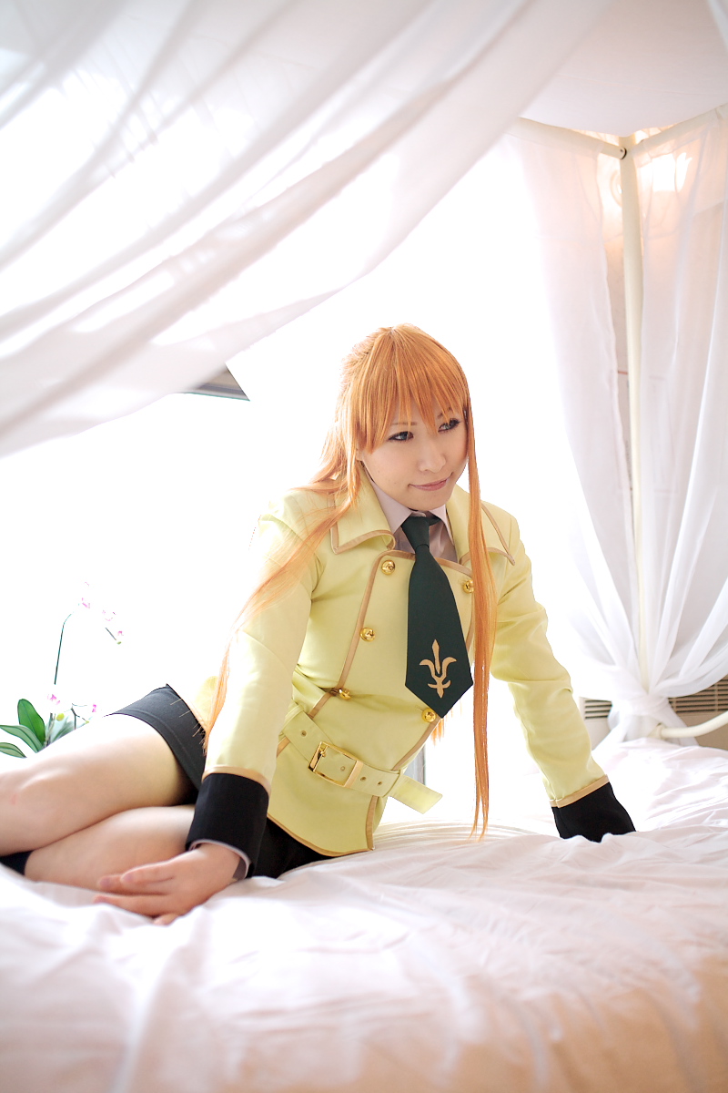 chippi, shirley fenette, code geass, highres, photo (medium), 1girl, asian, bed, bedroom, blazer, blue eyes, color contacts, cosplay, female focus, indoors, jacket, kneehighs, long hair, miniskirt, orange hair, school uniform, shirley fenette (cosplay), skirt, socks, solo