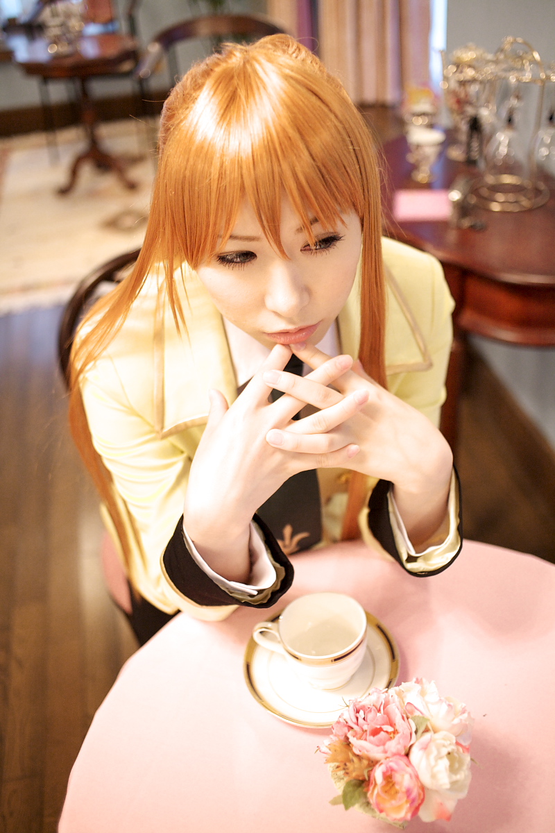 chippi, shirley fenette, code geass, highres, photo (medium), 1girl, asian, blazer, cosplay, female focus, indoors, jacket, long hair, orange hair, school uniform, shirley fenette (cosplay), sitting, solo, tea shop