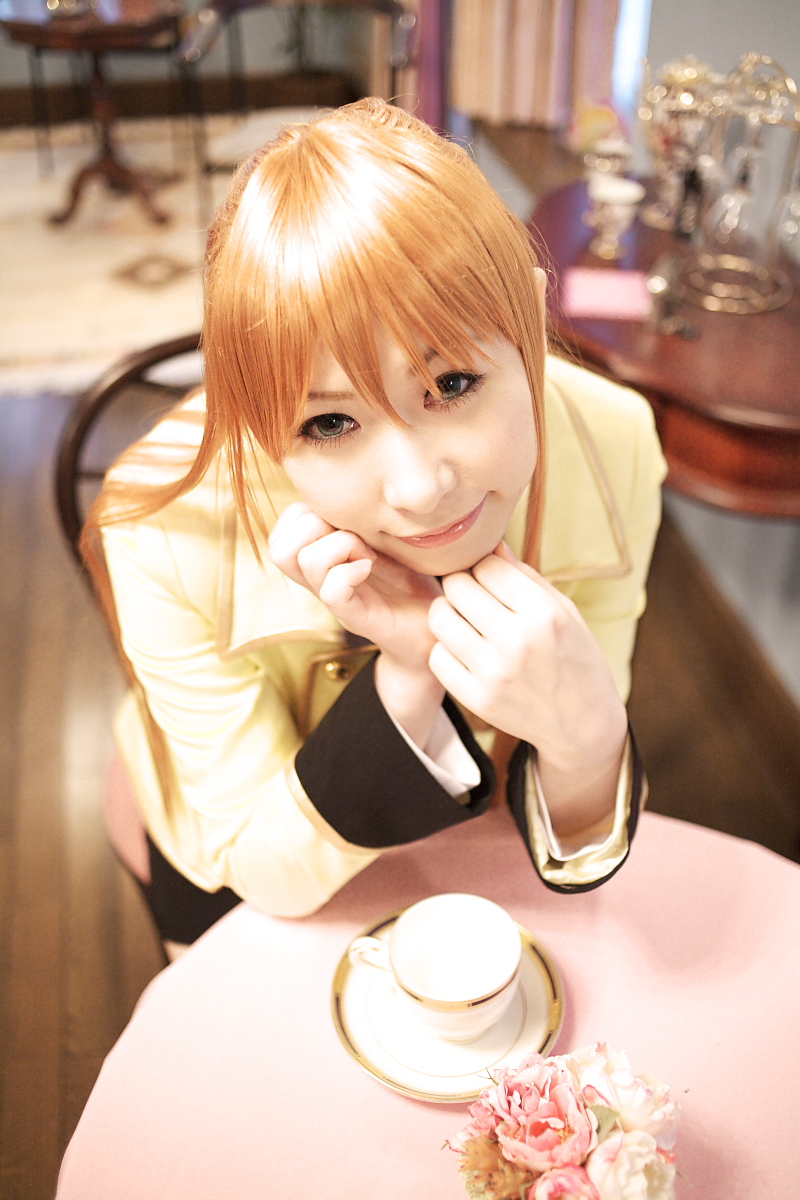 chippi, shirley fenette, code geass, highres, photo (medium), 1girl, asian, blazer, blue eyes, color contacts, cosplay, female focus, jacket, long hair, looking at viewer, orange hair, school uniform, shirley fenette (cosplay), sitting, solo, tea shop
