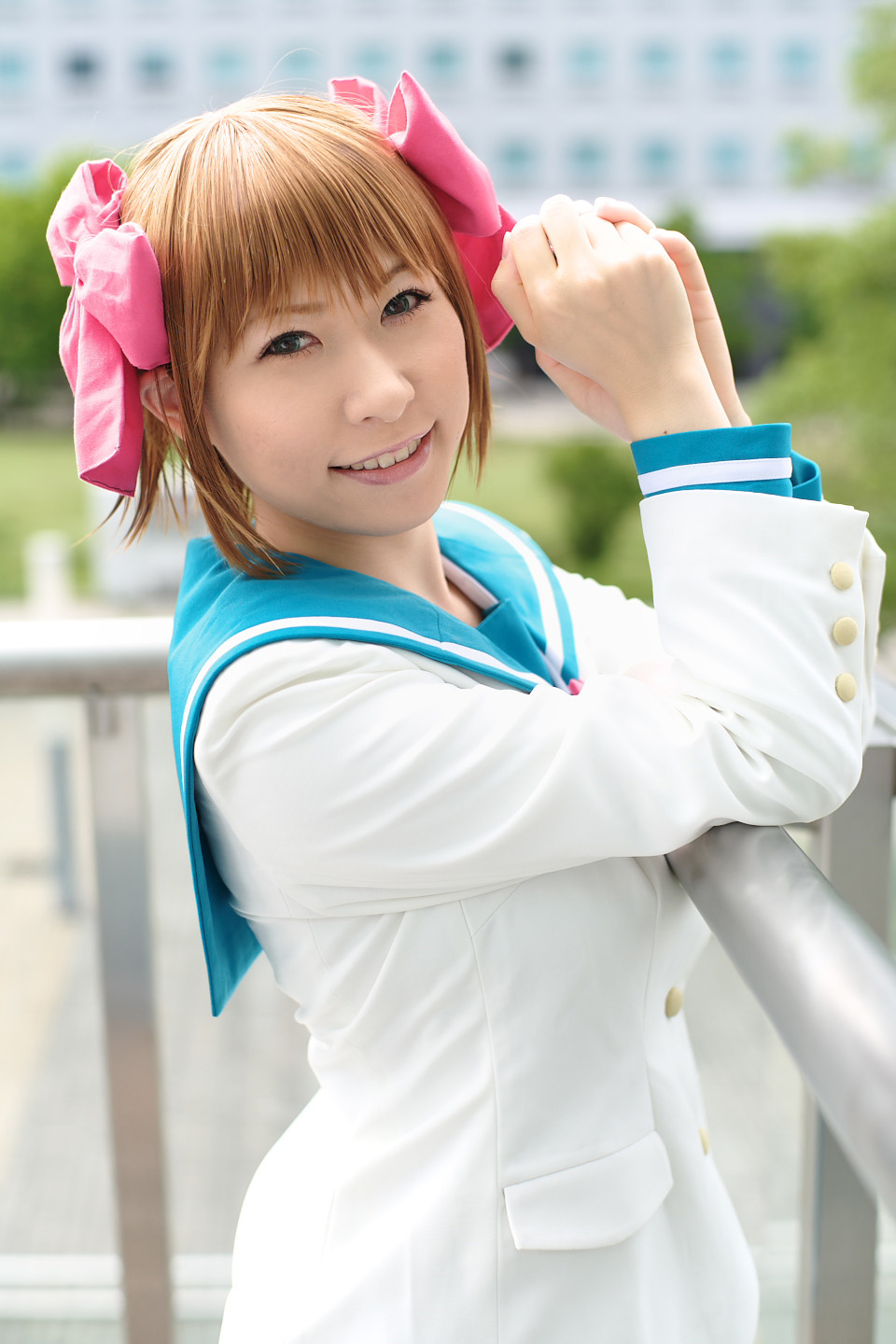chippi, amami haruka, idolmaster, idolmaster (classic), highres, photo (medium), 1girl, amami haruka (cosplay), asian, blazer, blue eyes, bow, brown hair, color contacts, cosplay, female focus, hair bow, jacket, looking at viewer, outdoors, sailor, school uniform, serafuku, short hair, smile, solo