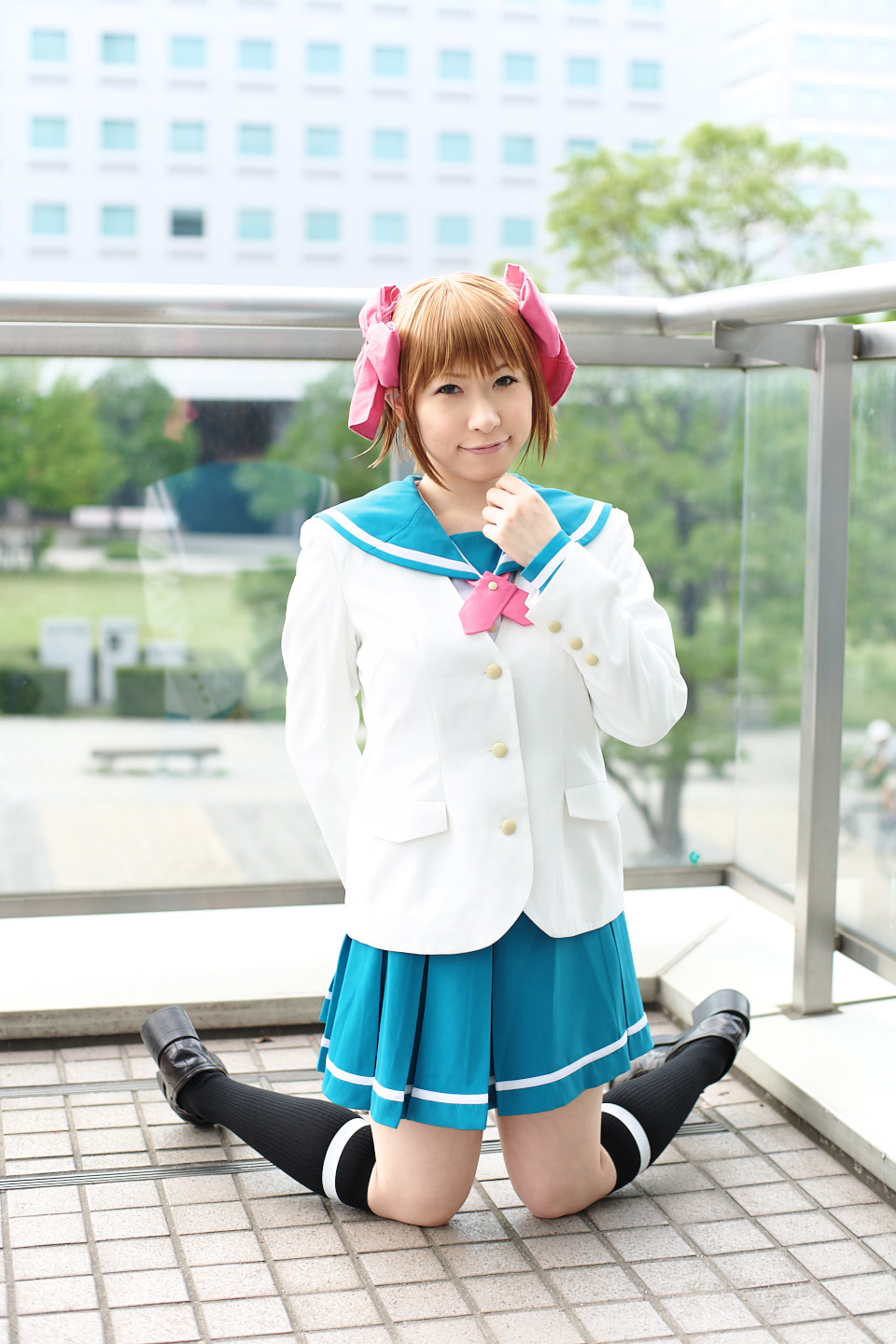 chippi, amami haruka, idolmaster, idolmaster (classic), highres, photo (medium), 1girl, amami haruka (cosplay), asian, black shoes, blazer, blue eyes, bow, brown hair, color contacts, cosplay, female focus, hair bow, jacket, kneehighs, kneeling, loafers, looking at viewer, outdoors, sailor, school uniform, serafuku, shoes, short hair, smile, socks, solo