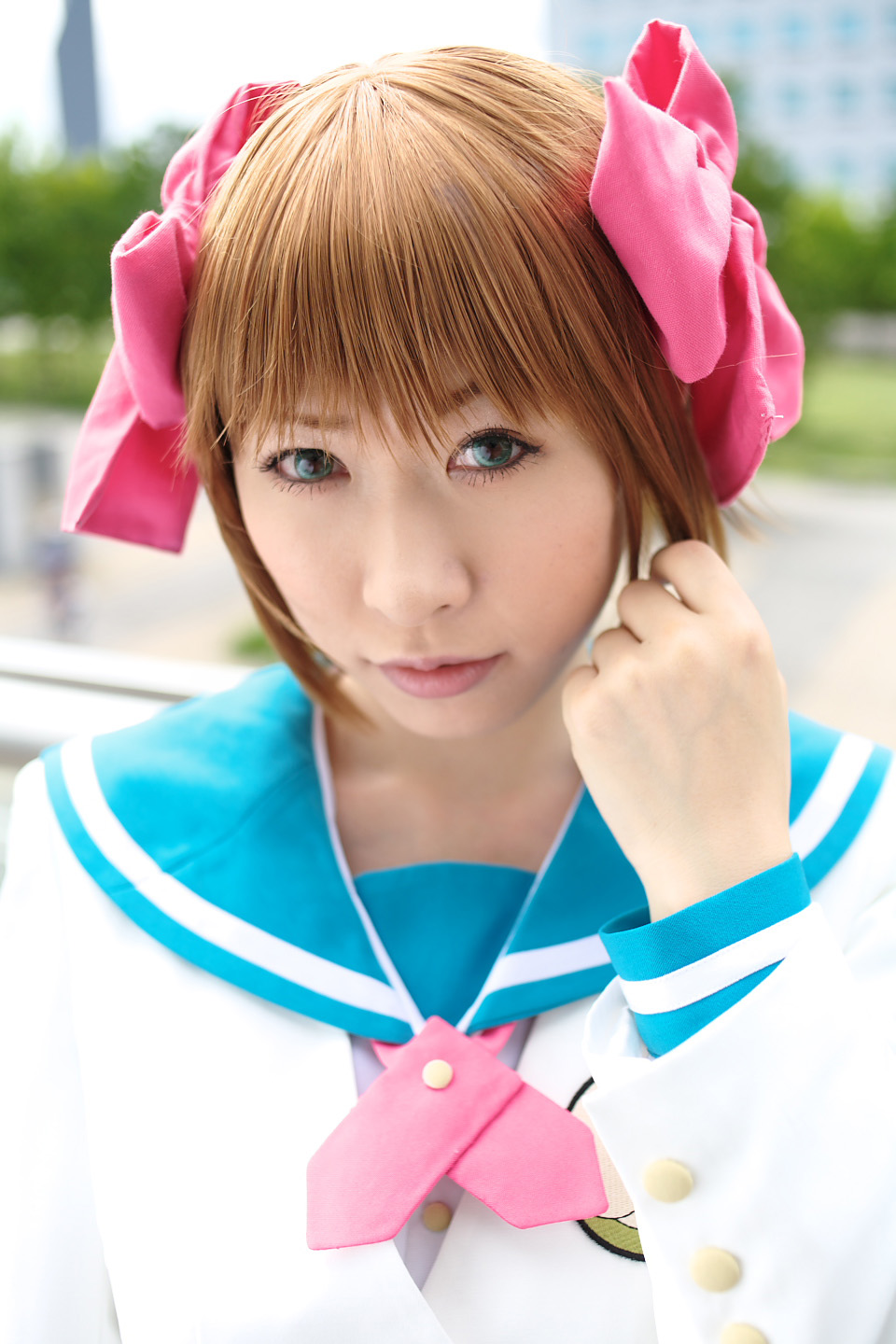chippi, amami haruka, idolmaster, idolmaster (classic), highres, photo (medium), 1girl, amami haruka (cosplay), asian, blazer, blue eyes, bow, brown hair, color contacts, cosplay, female focus, hair bow, jacket, looking at viewer, outdoors, sailor, school uniform, serafuku, short hair, solo