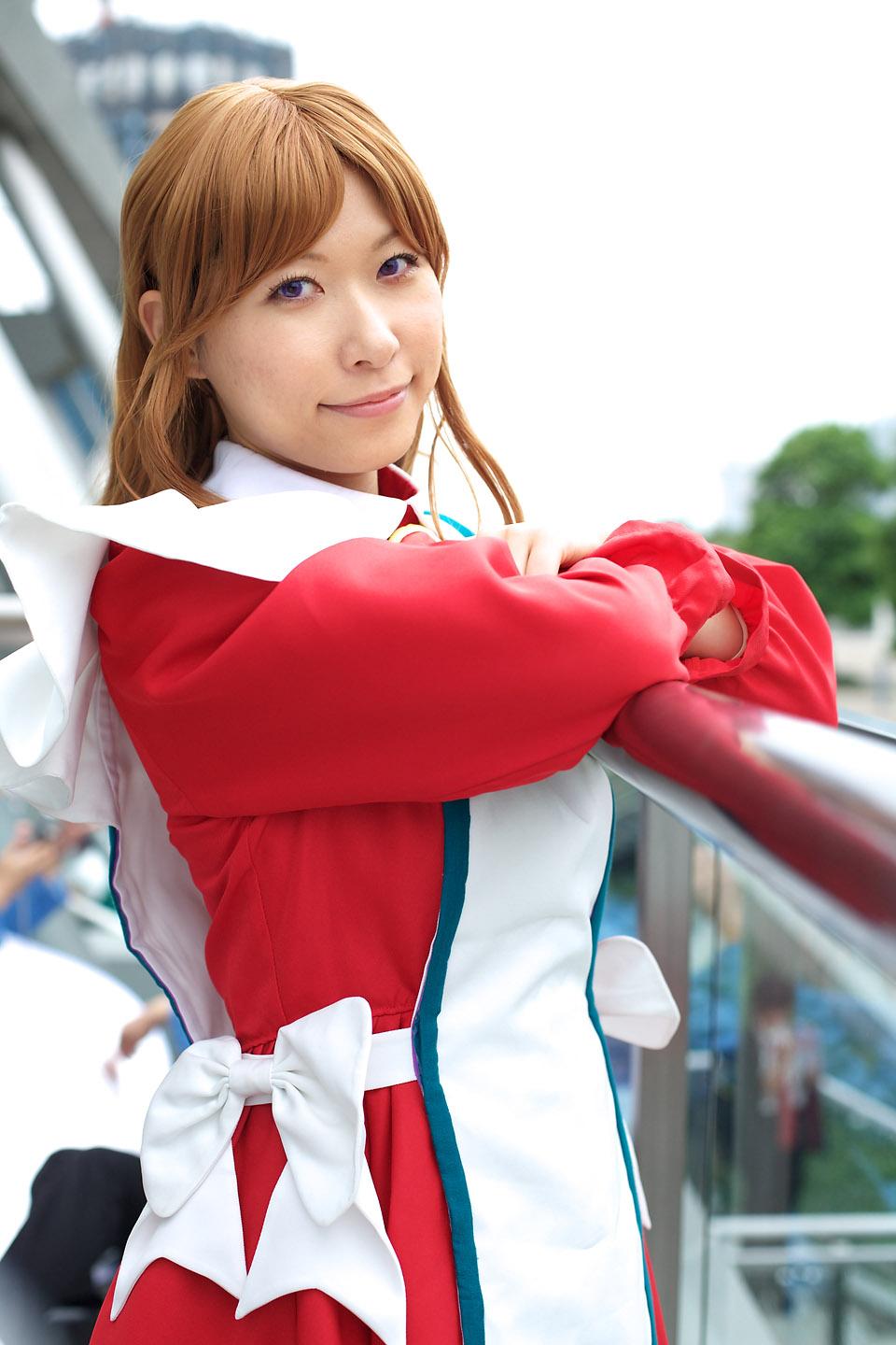 chippi, miya clochette, my-otome, highres, photo (medium), 1girl, apron, asian, blurry, cosplay, depth of field, looking at viewer, maid, maid apron, miya clochette (cosplay), outdoors, school uniform, short hair, solo focus, standing