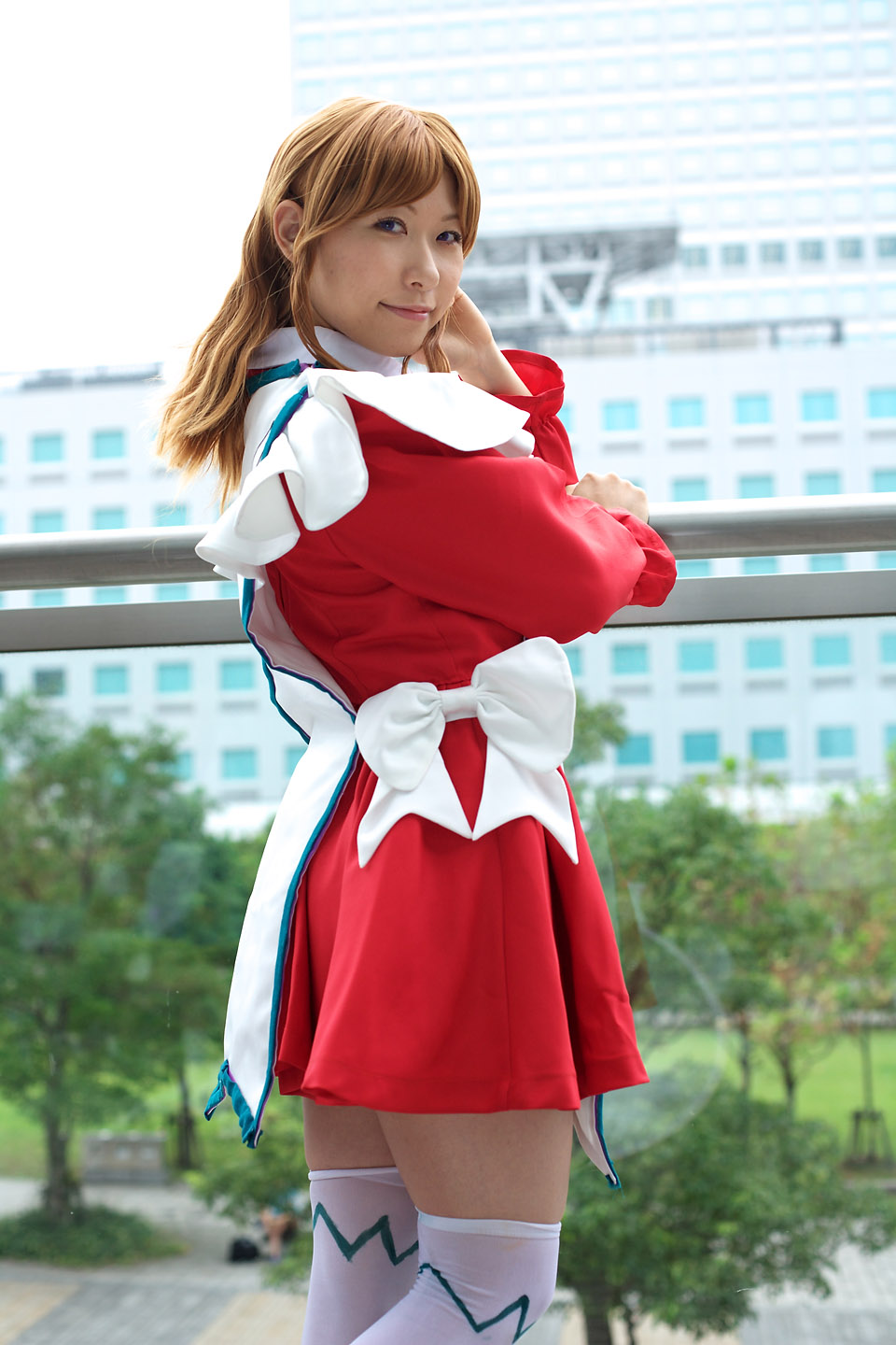 chippi, miya clochette, my-otome, highres, photo (medium), 1girl, apron, asian, blurry, cosplay, depth of field, female focus, looking at viewer, looking back, maid, maid apron, miya clochette (cosplay), outdoors, school uniform, short hair, solo, standing, thighhighs, white thighhighs, zettai ryouiki