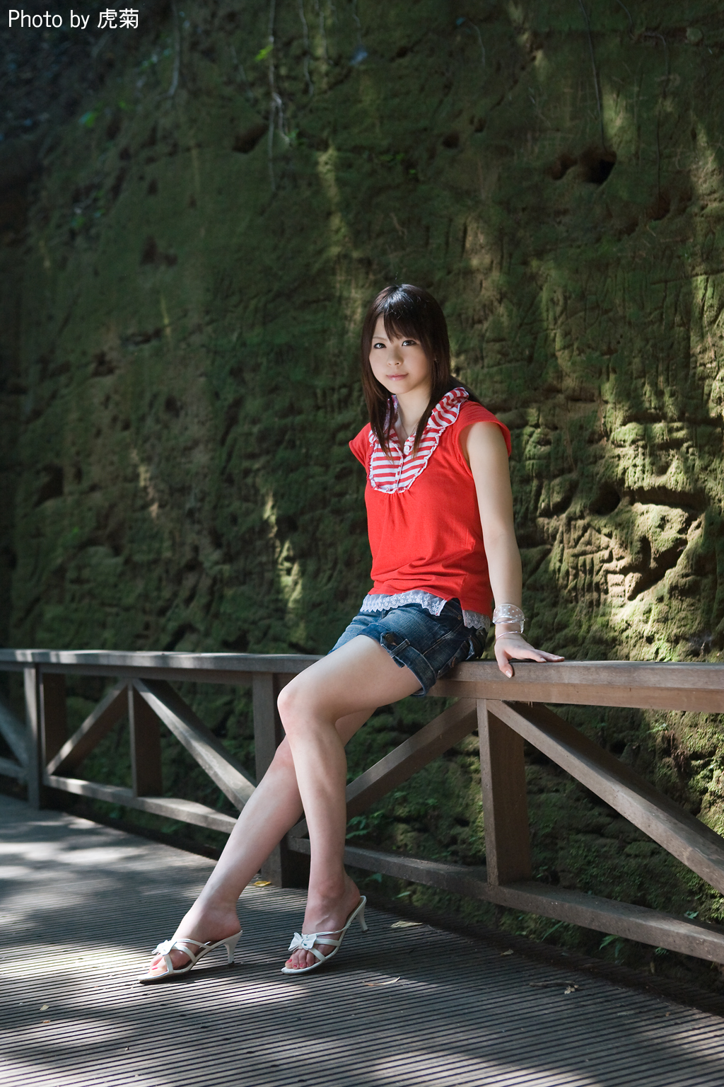 katou mari, highres, photo (medium), bridge, denim, legs, shirt, shorts, t-shirt
