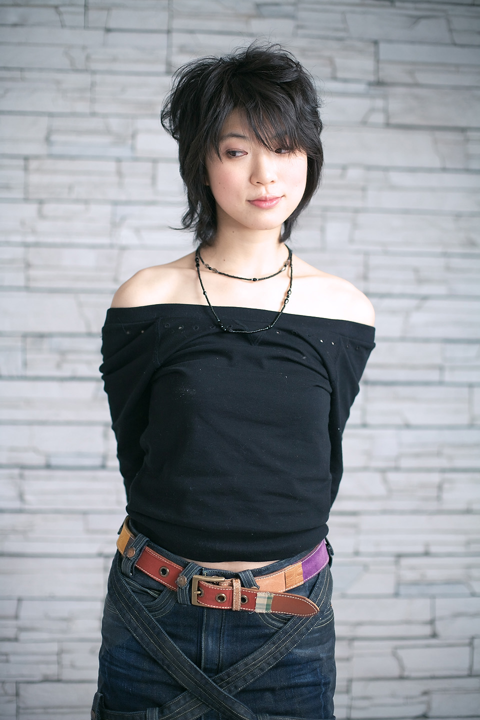 komiyama maki, highres, photo (medium), bare shoulders, denim, jeans, pants, sweater