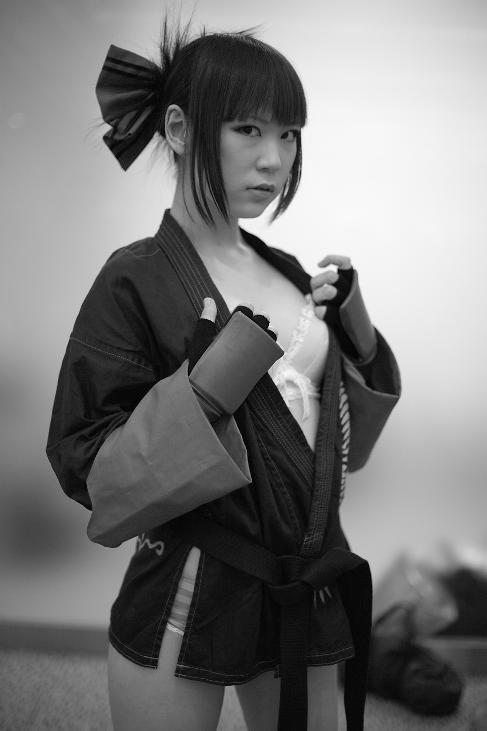 kabi, aihara makoto, rumble roses, highres, photo (medium), bow, bra, cosplay, gloves, hair bow, lingerie, monochrome, open gi, the black belt demon, underwear